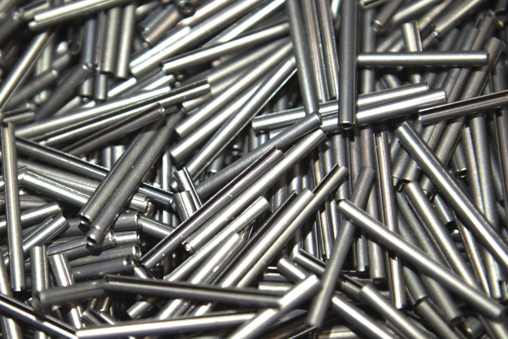 studs, lock nuts, cotter pins as the background or texture